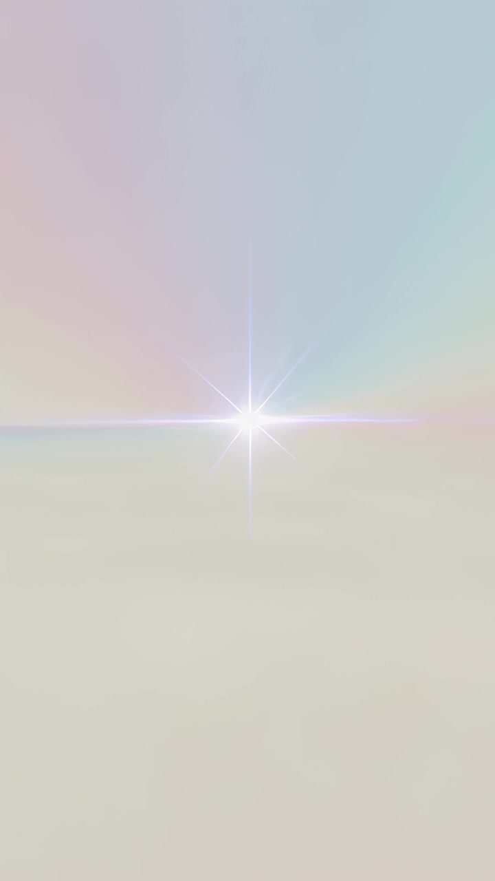 Vidéo verticale : Un point lumineux à l'horizon, un cœur d'étoile étincelant grandissant dans un ciel pastel et émettant des rayons.