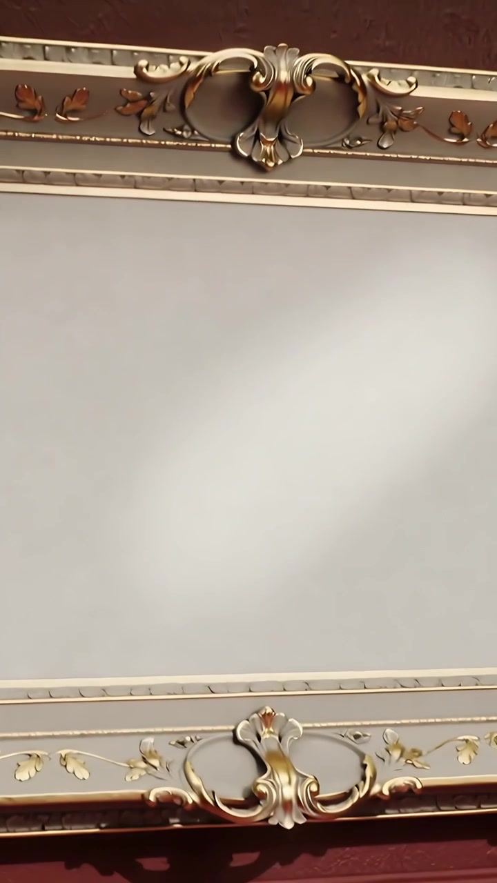 Vertical video: Panning camera from closeup showing panel with gold trim on red wall showing detail