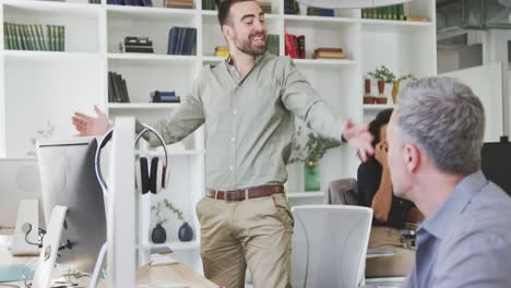 Colleagues-discussing-in-the-office