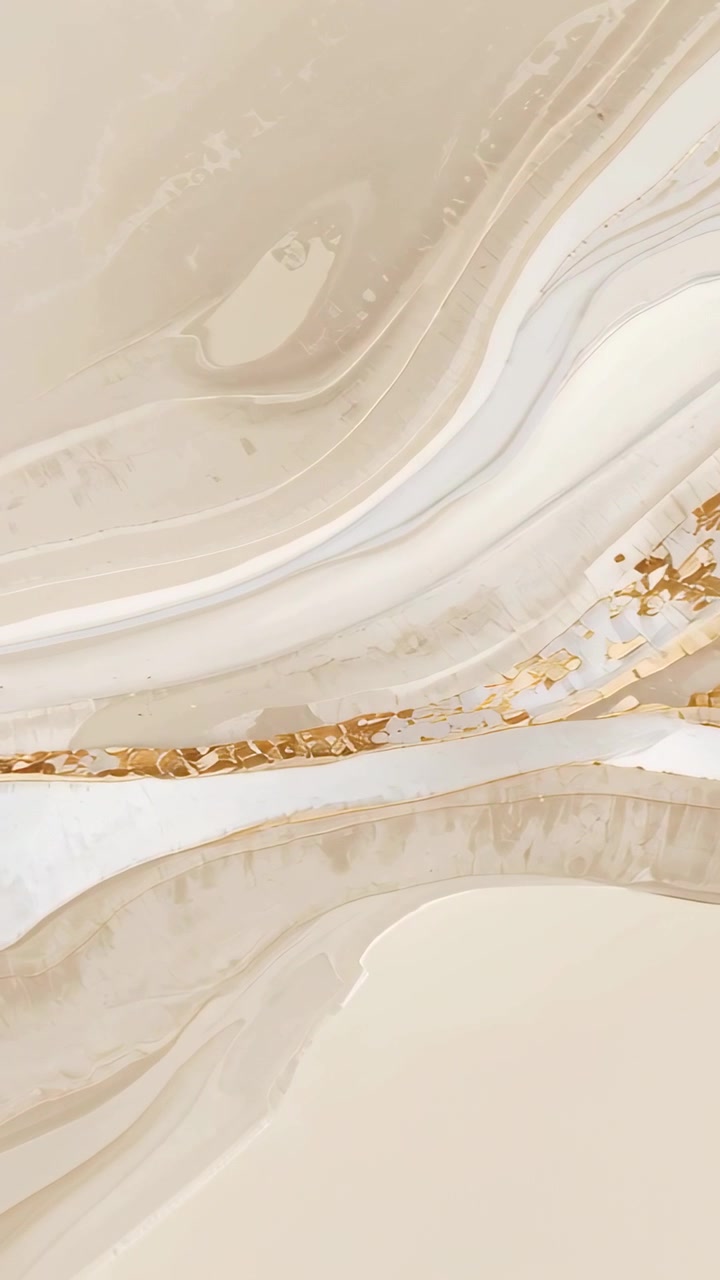Video verticale: Marmo digitale in formato verticale che si sposta a sinistra, rivelando una venatura d'oro e un nastro color crema