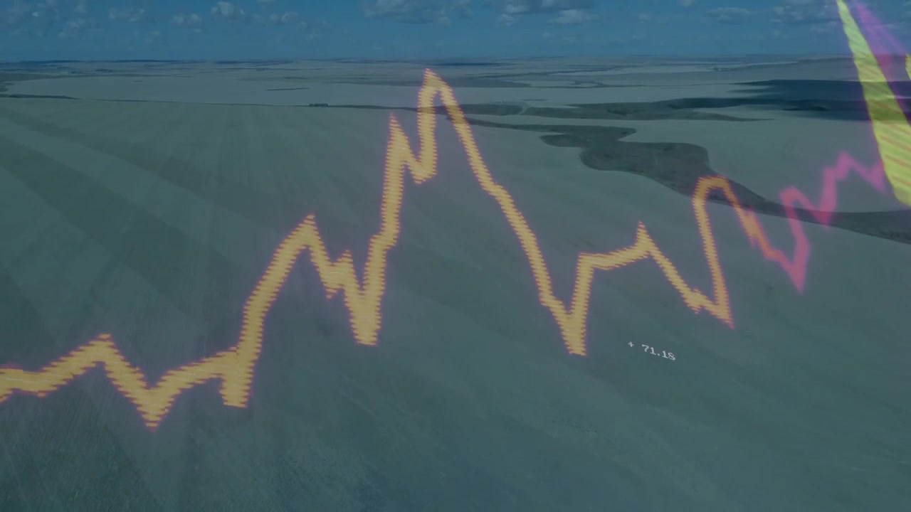 Finance on playback as orange line graph peaking over coastal HUD, marker rising, values updating