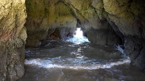 rock tunnels and sea caves in portimao, algarve, portugal