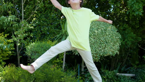 little boy jumping and smiling