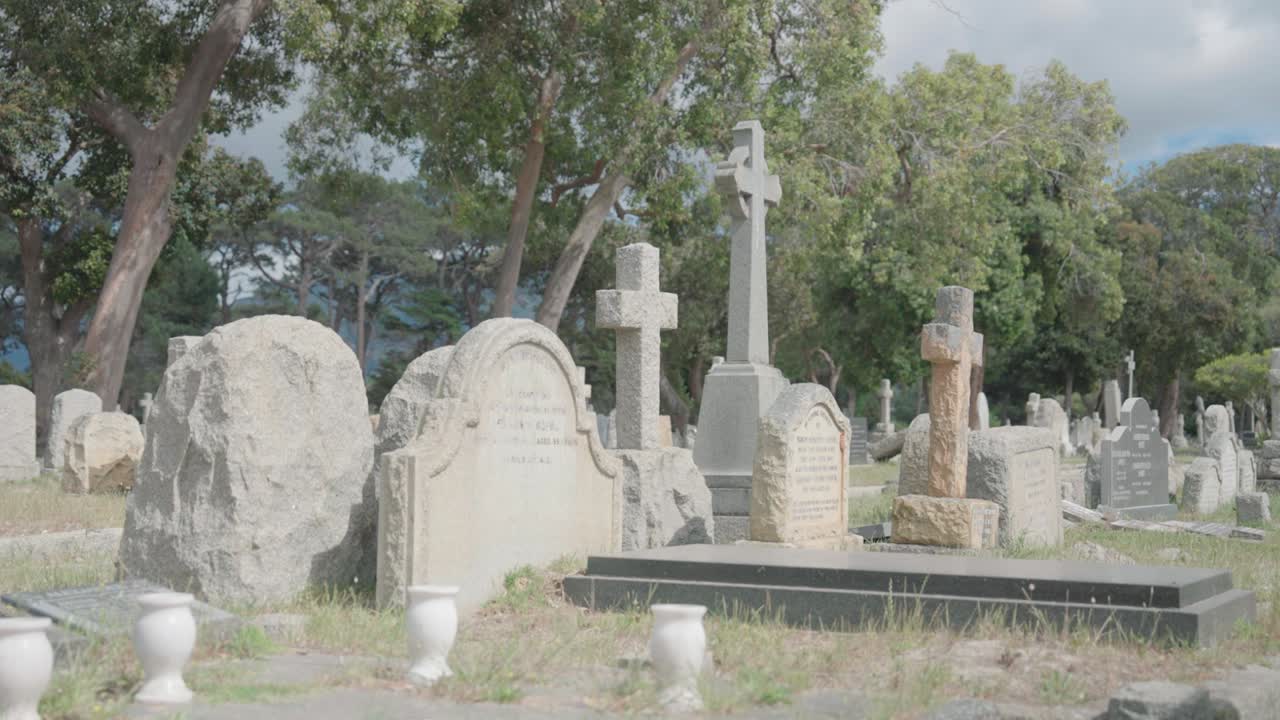 Slow pan to the left in graveyard in Cape Town, South Africa