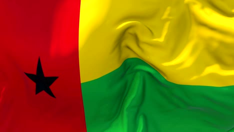 guinea biisau flag waving in wind slow motion animation . 4k realistic fabric texture flag smooth blowing on a windy day continuous seamless loop background.