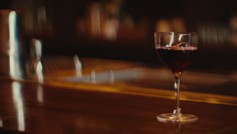 red wine cocktail at a bar