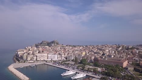 drone footage of corfu's port and old city - greece