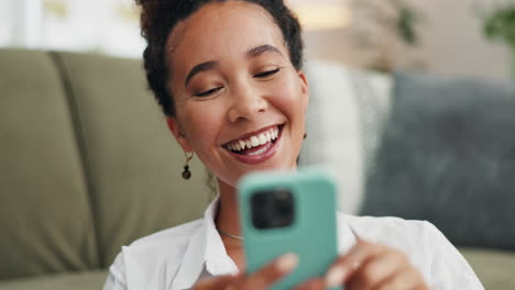 woman excitedly using smartphone