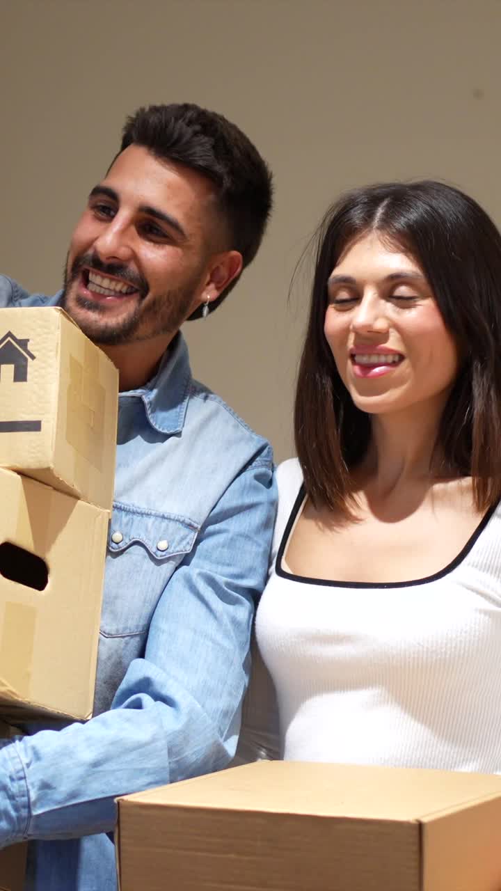 Couple Moving into New Home with Joy