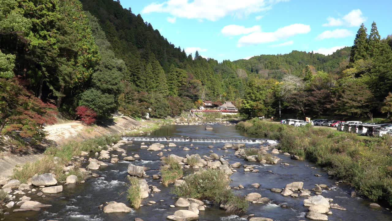 Taigetsu bridge across Tomoe river at Korankei gorge during autumn season