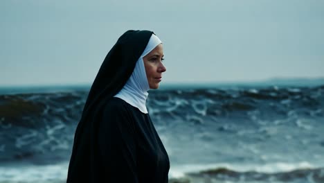 nun on a stormy beach