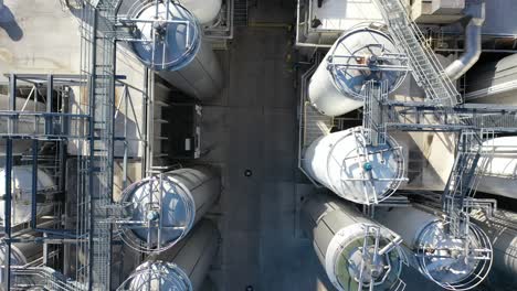 aerial view of industrial facility with storage tanks