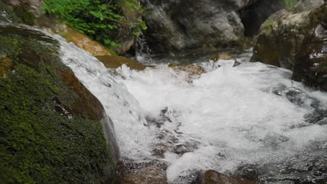 panoramic view on cascade on crystal clear stream