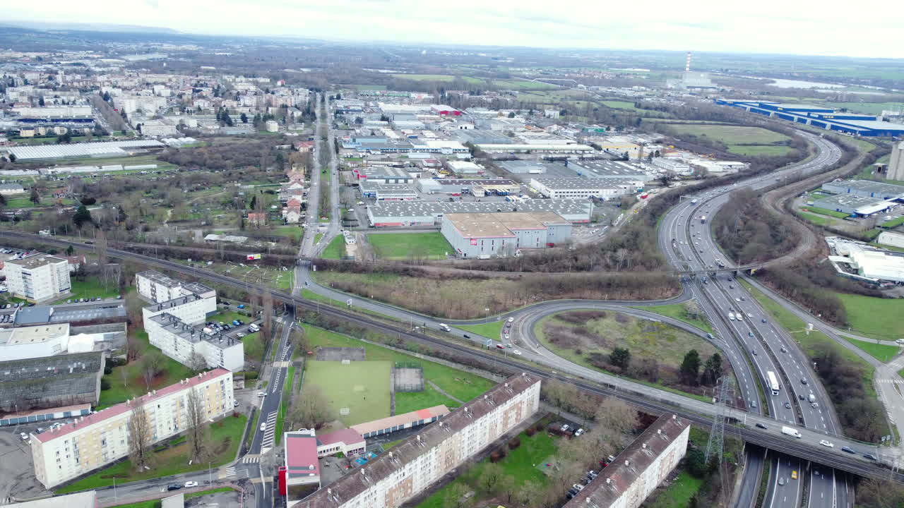 Aerial View of a City with Highway and Residential Areas