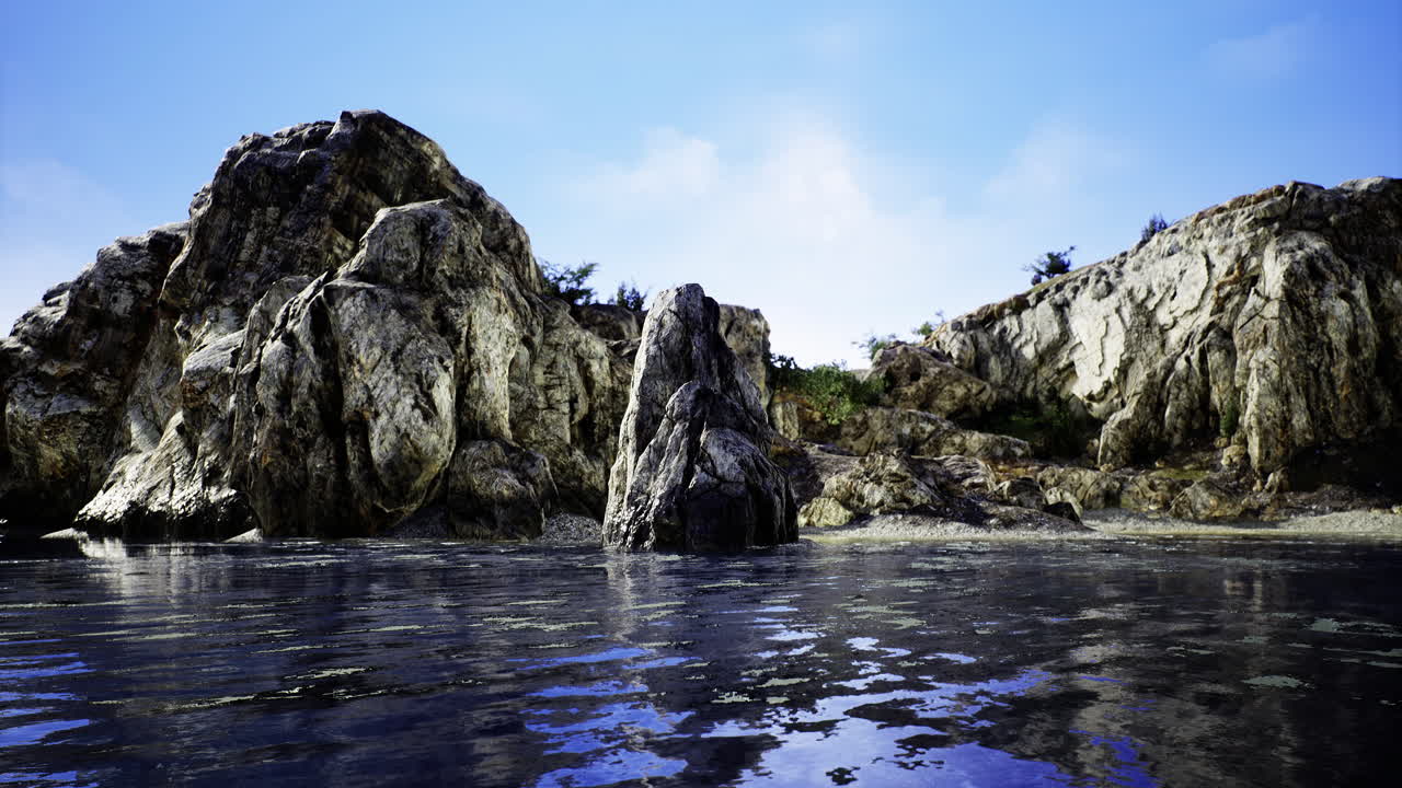Scenic coastal view with rocky formations and calm waters in bright sunlight