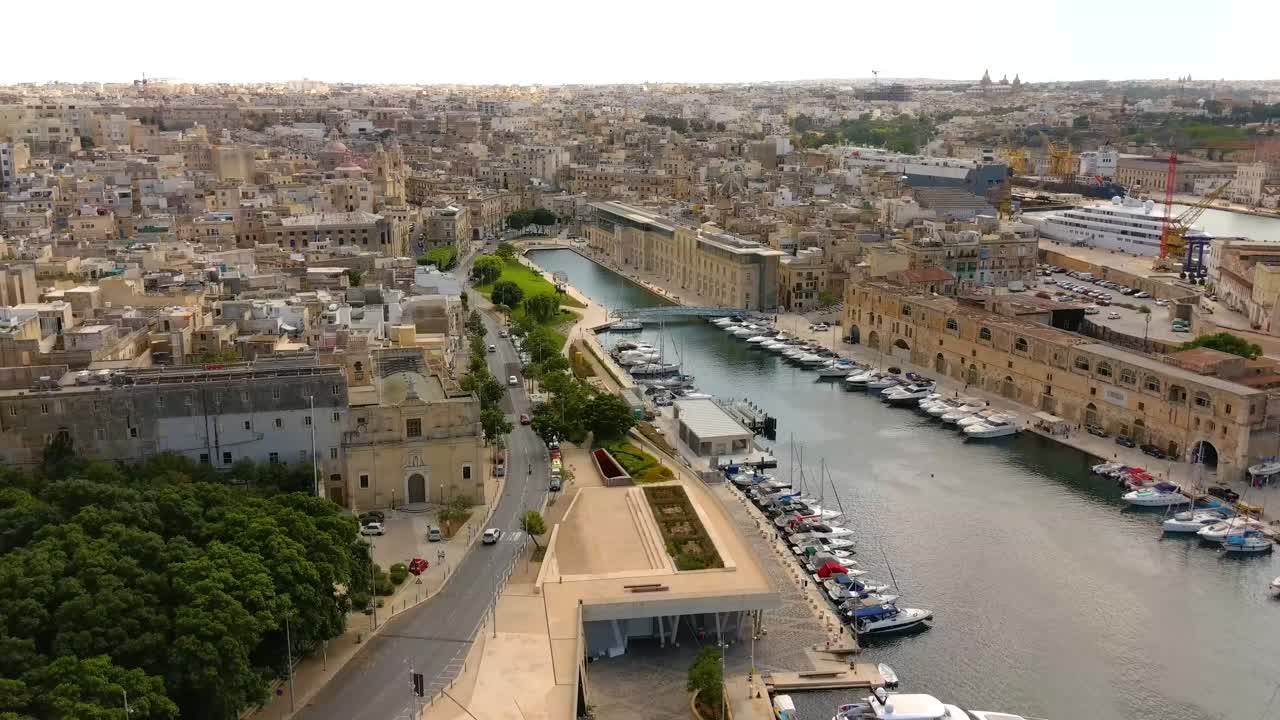 Tracking drone shot of Birgu's dock