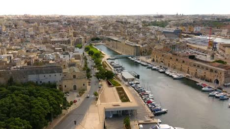 Tracking-drone-shot-of-Birgu's-dock