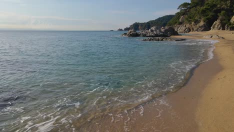 Mediterranean-Beach-Paradisiaca-Turquoise-Blue-Waters-No-People-Aerial-View-Drone-Spain-Catalunya-Costa-Brava-Blanes-Lloret-De-Mar-Mallorca-Balearic-Islands