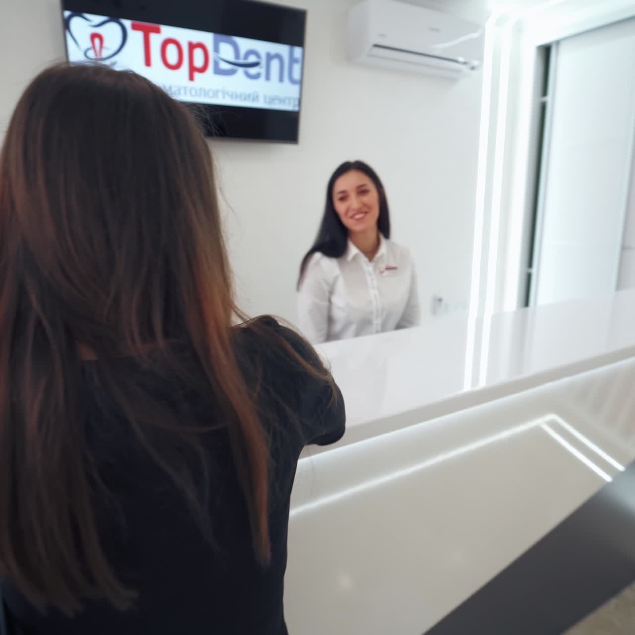 Woman stepping up stairway