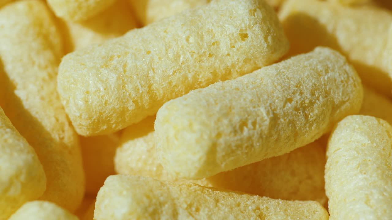 가벼운 스낵의 배경 - 옥수수 스틱