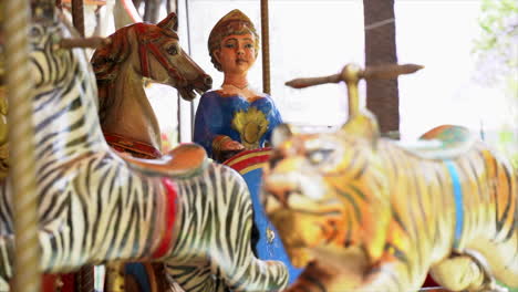 Close-up-of-carousel-animals-in-an-empty-amusement-park