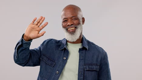 mature, man and waving at you with face in studio