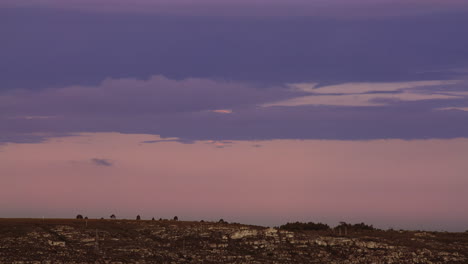 4k footage of a dark sunset sky landscape on dusk amazing light of nature cloudscape sky and clouds moving away rolling 4k colorful dark sunset clouds