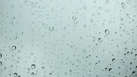 rain-days,-heavy-rain-falling-on-window-surface-during-storm