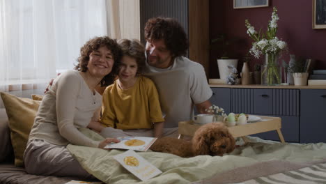 family celebrates easter in bed