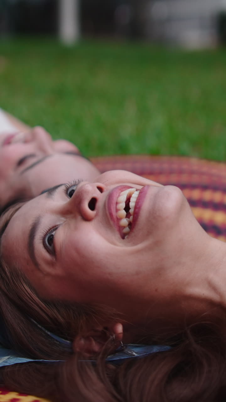 Smiling women relaxing outdoors