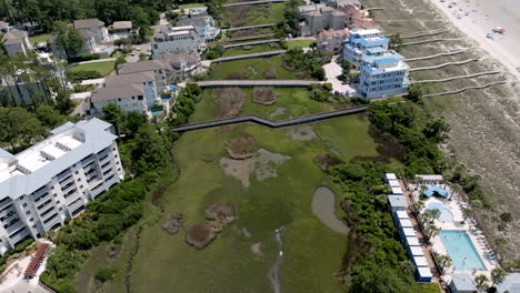 boardwalks span hilton head’s coastal marsh, connecting resorts and the beach while preserving the natural tidal wetlands and saltwater beauty