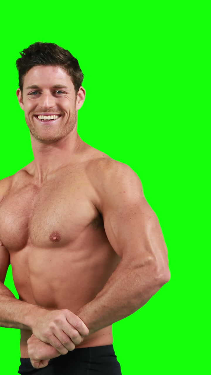 Muscular man flexing his muscles