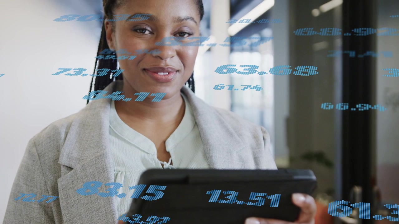Woman scanning tablet in corridor, animating blue numbers and revealing business metrics on screen