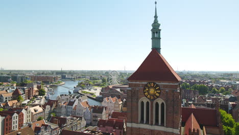 aerial view of st bridget church in old town gdansk in poland during daytime - drone shot