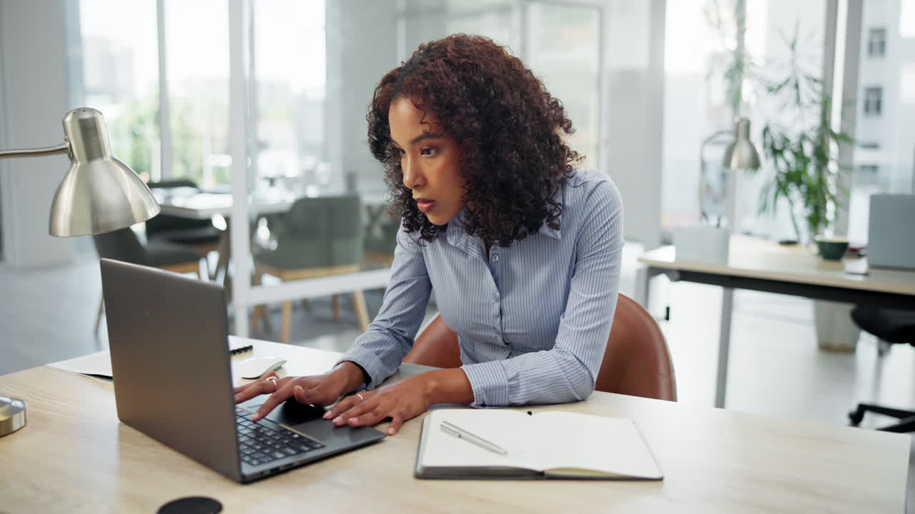 Professional woman working at her desk in an office