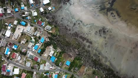 Vista-Aérea-De-Arriba-Hacia-Abajo-De-Los-Suburbios-De-San-Juan-Y-Casas-Reconstruidas-Después-Del-Desastre-Del-Huracán