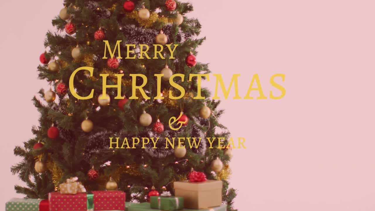크리스마스 트리 위에 메리 크리스마스 텍스트의 애니메이션