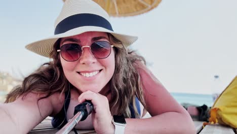 sunburn warning: woman with red skin at the beach