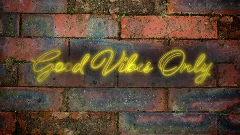 good vives only in yellow neon on brick wall background