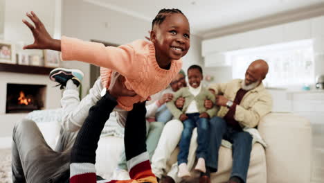 Happy,-plane-and-relax-with-black-family-in-living