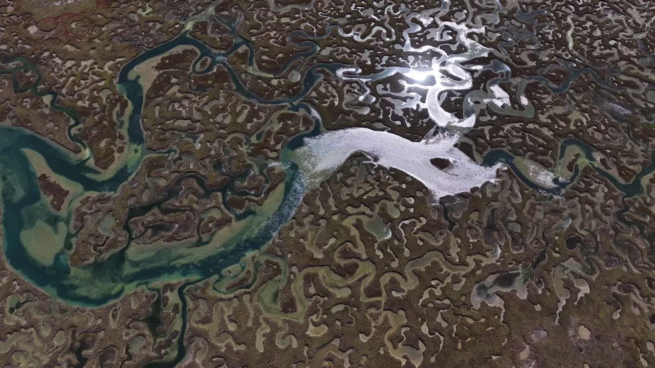 Water patterns on a estuary channels and lines