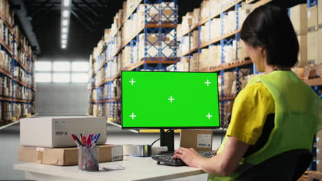 vertical video asian staff looks at isolated screen shipping route on package tracking software