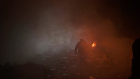 person exploring a misty cave