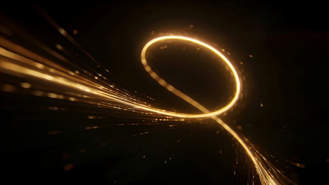 Sweeping golden ribbon entering left frame, curving into loop, emitting sparks against black void