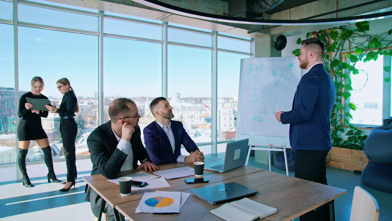 Business team discussing new business project together in office. Business meeting
