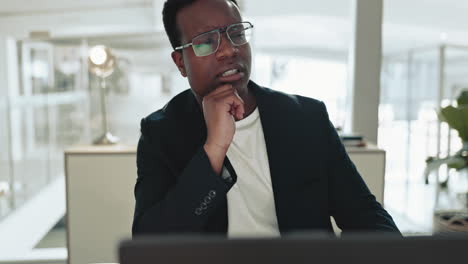 doubt, thinking and black man on laptop