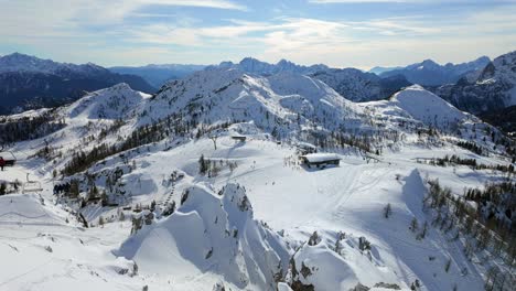 beautiful view of the nassfeld alpine ski resort with various pistes from a distance during winter in austria