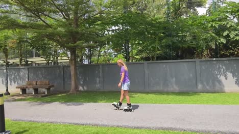 woman roller skating in a park