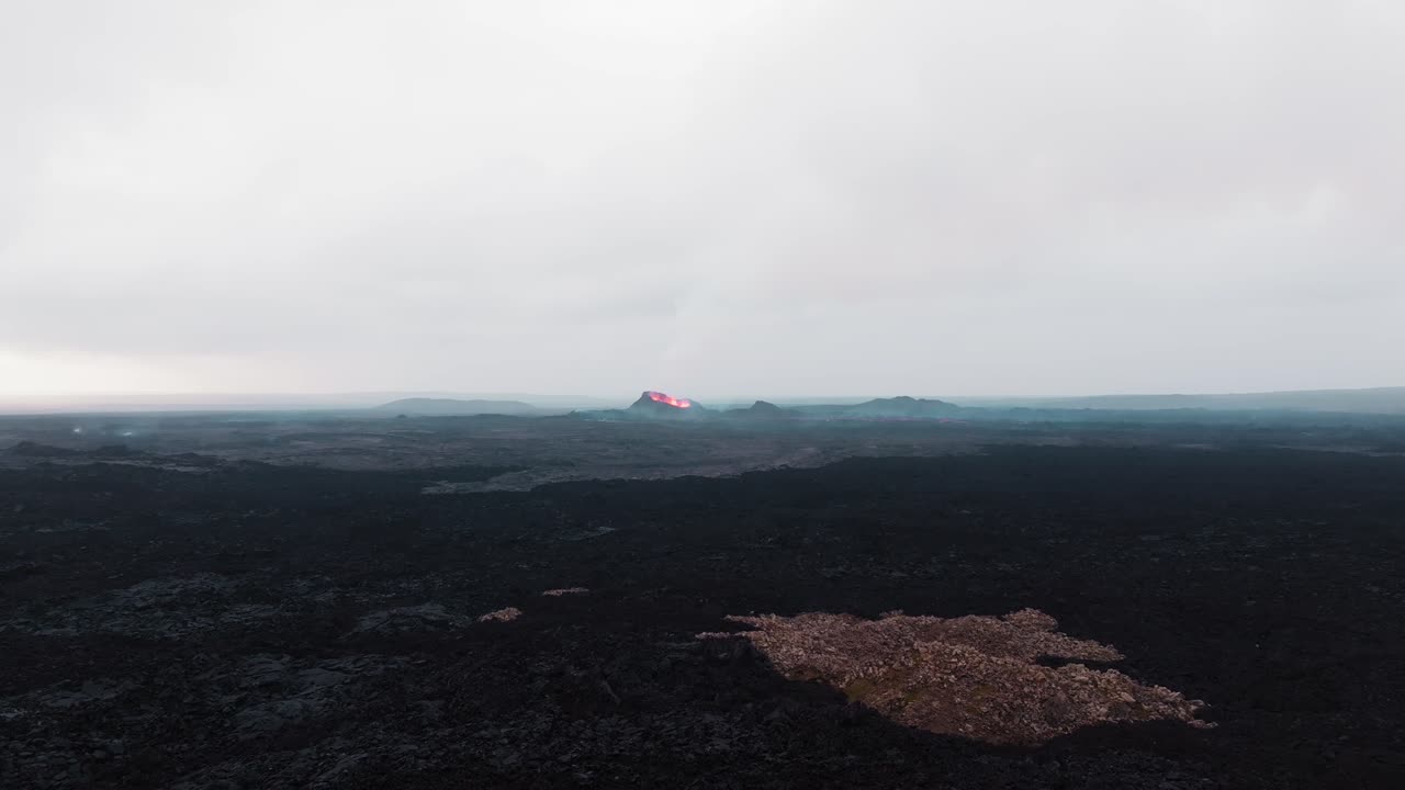 New volcanic crater within the vast lava field in the Reykjanes Peninsula. Aerial drone overview