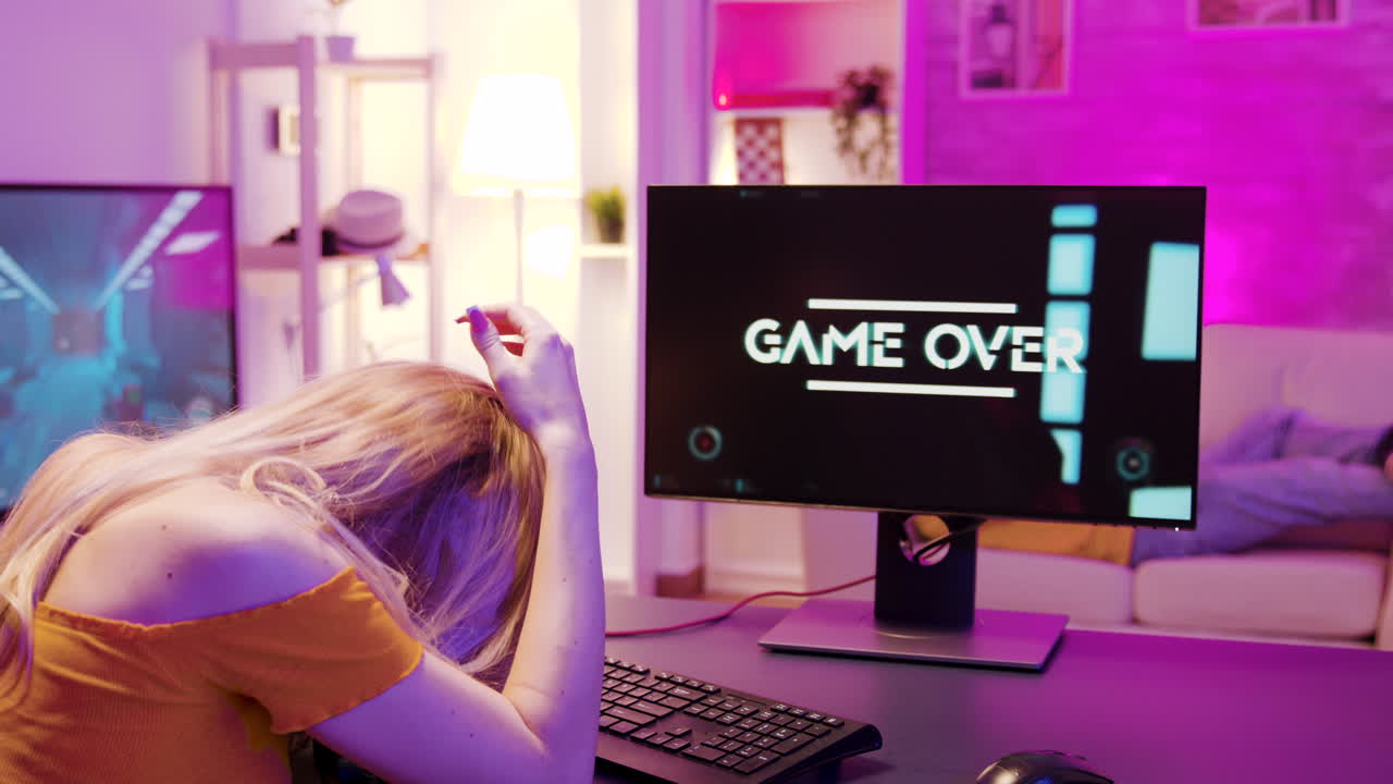 Woman losing at a video game